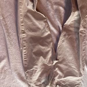 Gender neutral full legged tan jeans